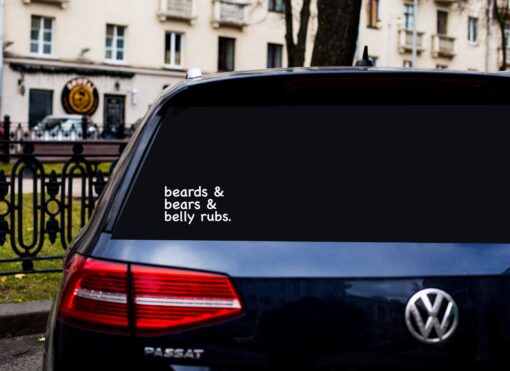 A car with the words beards and bears and belly rubs on it.