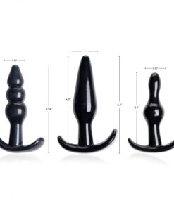 A set of three different sizes of black dildos.